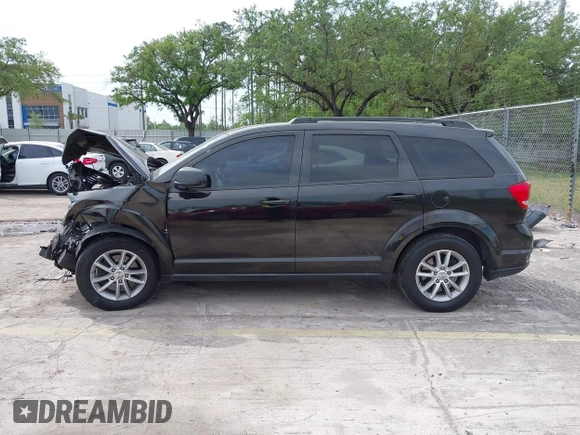 2015 Dodge Journey SXT with VIN 3C4PDCBB3FT577121, listed as a IAAI auction lot 41855712 with Not Provided miles and . Bid and sale history available at DreamBid. Image 14.