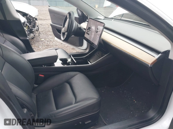 2020 Tesla Model 3 Long Range with VIN 5YJ3E1EB6LF618931, listed as a IAAI auction lot 41867451 with 47,502 mi miles and . Bid and sale history available at DreamBid. Image 5.