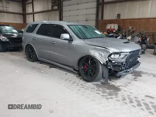 2017 Dodge Durango R/T with VIN 1C4SDJCT0HC799202, listed as a IAAI auction lot 42295142 with 83,103 mi miles and . Bid and sale history available at DreamBid. Image 1.