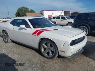 2014 Dodge Challenger R/T with VIN 2C3CDYBT6EH185590, listed as a IAAI auction lot 42536813 with 198,854 mi miles and . Bid and sale history available at DreamBid. Image 1.