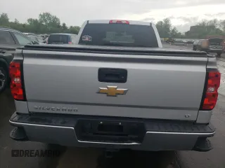 2018 Chevrolet Silverado 1500 LT with VIN 1GCVKREH8JZ102484, listed as a Copart auction lot 55114225 with 59,185 mi miles and Salvage Title. Bid and sale history available at DreamBid. Image 6.