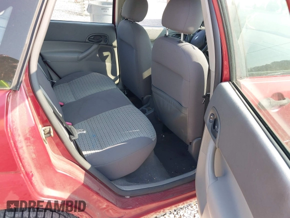 2005 Ford Focus S with VIN 1FAFP34N65W272608, listed as a IAAI auction lot 42573272 with 132,102 mi miles and . Bid and sale history available at DreamBid. Image 8.