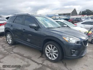 2014 Mazda CX-5 Grand Touring with VIN JM3KE2DY3E0361940, listed as a IAAI auction lot 41708680 with 99,719 mi miles. Bid and sale history available at carsss.com. Image 1.