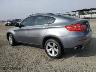 2012 BMW X6 50i with VIN 5UXFG8C53CL590367, listed as a Copart auction lot 86650664 with 0 mi miles and Salvage Title. Bid and sale history available at carsss.com. Image 2.