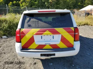 2020 Chevrolet Suburban Commercial with VIN 1GNSKKEC4LR213767, listed as a Copart auction lot 76527014 with 142,132 mi miles and Clean Title. Bid and sale history available at carsss.com. Image 6.