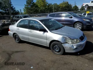 2002 Mitsubishi Lancer ES with VIN JA3AJ26E72U070346, listed as a Copart auction lot 70280254 with 168,260 mi miles and Salvage Title. Bid and sale history available at DreamBid. Image 4.