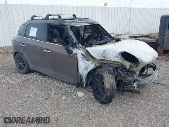 2012 MINI Countryman S with VIN WMWZC3C56CWM26958, listed as a IAAI auction lot 41765541 with Not Provided miles and . Bid and sale history available at DreamBid. Image 1.