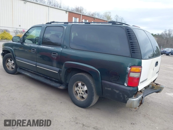 2002 Chevrolet Suburban LS with VIN 1GNFK16Z92J122439, listed as a IAAI auction lot 41806539 with 403,128 mi miles. Bid and sale history available at carsss.com. Image 3.