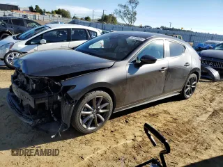 2019 Mazda Mazda3 Hatchback with VIN JM1BPBJM8K1125293, listed as a Copart auction lot 82705384 with 73,062 mi miles and Salvage Title. Bid and sale history available at carsss.com. Image 1.