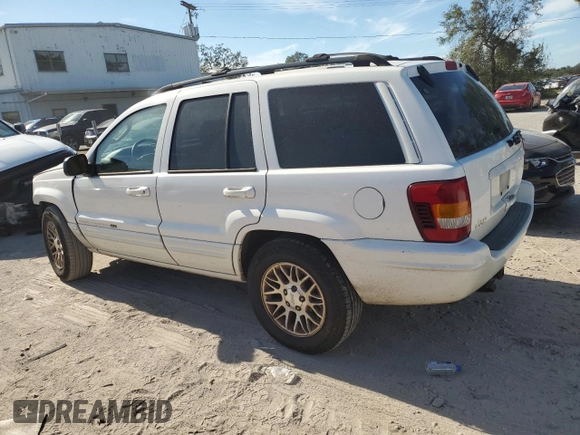 2002 Jeep Grand Cherokee Limited with VIN 1J4GX58S32C320843, listed as a Copart auction lot 77663864 with 289,537 mi miles and Salvage Title. Bid and sale history available at DreamBid. Image 2.