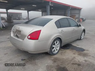 2005 Nissan Maxima 3.5 SL with VIN 1N4BA41E65C859869, listed as a IAAI auction lot 41528302 with 120,321 mi miles. Bid and sale history available at carsss.com. Image 4.