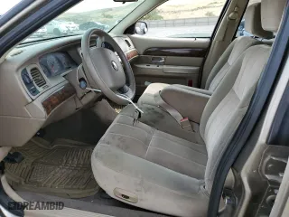 2005 Mercury Grand Marquis GS with VIN 2MEFM74W75X627162, listed as a Copart auction lot 64709124 with 118,697 mi miles and Salvage Title. Bid and sale history available at carsss.com. Image 7.