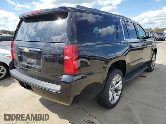 2018 Chevrolet Suburban LT with VIN 1GNSKHKC8JR127057, listed as a Copart auction lot 61868222 with 81,707 mi miles and . Bid and sale history available at DreamBid. Image 4.
