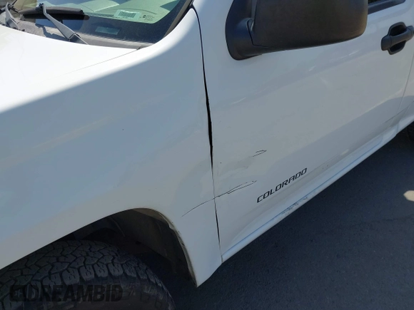 2005 Chevrolet Colorado LS Z85 z VIN 1GCCS146458251947, wystawiony jako IAAI lot #42527497 z przebiegiem 177 207 mil mil oraz . Historia ofert i sprzedaży dostępna na DreamBid. Obrazek 6.