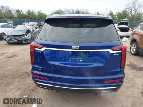 2023 Cadillac XT6 AWD Premium Luxury with VIN 1GYKPDRS2PZ126666, listed as a IAAI auction lot 40963833 with 23,535 mi miles and . Bid and sale history available at DreamBid. Image 17.