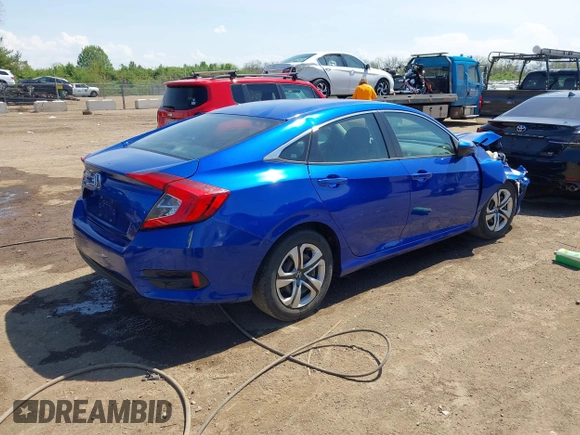 2018 Honda Civic LX with VIN 19XFC2F53JE020297, listed as a IAAI auction lot 42114807 with 124,058 mi miles and . Bid and sale history available at carsss.com. Image 4.