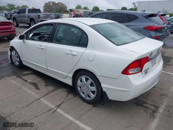 2010 Honda Civic Sdn LX with VIN 2HGFA1F58AH531042, listed as a IAAI auction lot 41933448 with 253,699 mi miles. Bid and sale history available at carsss.com. Image 3.