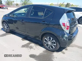 2012 Toyota Prius c One with VIN JTDKDTB36C1527223, listed as a IAAI auction lot 42002927 with 138,176 mi miles. Bid and sale history available at carsss.com. Image 3.