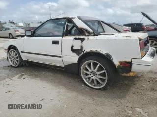1986 Toyota MR2 z VIN JT2AW15C2G0049232, wystawiony jako Copart lot #47584895 z przebiegiem 185 369 mil mil oraz Tytuł czysty. Historia ofert i sprzedaży dostępna na DreamBid. Obrazek 2.