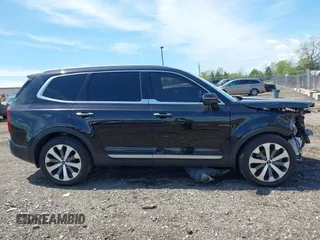 2021 Kia Telluride S with VIN 5XYP6DHC9MG103470, listed as a IAAI auction lot 42073853 with 90,942 mi miles and . Bid and sale history available at DreamBid. Image 14.