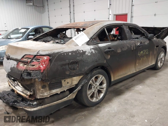 2014 Ford Taurus SEL with VIN 1FAHP2E81EG136022, listed as a IAAI auction lot 41937132 with 76,285 mi miles and . Bid and sale history available at DreamBid. Image 4.