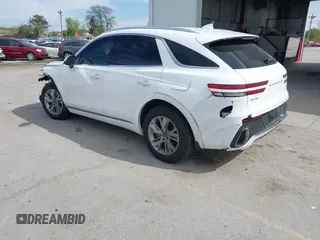 2022 Genesis GV70 2.5T with VIN KMUMADTB0NU043317, listed as a IAAI auction lot 42222034 with 30,566 mi miles and . Bid and sale history available at DreamBid. Image 3.