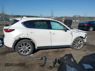 2020 Mazda CX-5 Grand Touring with VIN JM3KFBDM6L0751471, listed as a IAAI auction lot 41914849 with Not Provided miles and . Bid and sale history available at carsss.com. Image 13.