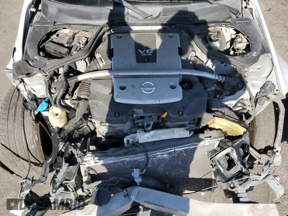 2008 Nissan 350Z Touring z VIN JN1BZ34EX8M753158, wystawiony jako Copart lot #57711145 z przebiegiem 113 142 mil mil oraz Szkoda całkowita • Salvage title. Historia ofert i sprzedaży dostępna na DreamBid. Obrazek 11.