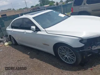 2015 BMW 7 Series 750Li xDrive with VIN WBAYF8C57FD655004, listed as a IAAI auction lot 42272205 with 77,677 mi miles and . Bid and sale history available at DreamBid. Image 14.