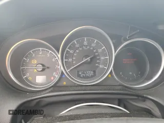 2016 Mazda CX-5 Grand Touring z VIN JM3KE2DY5G0676290, wystawiony jako Copart lot #54155325 z przebiegiem 124 743 mil mil oraz Szkoda całkowita • Salvage title. Historia ofert i sprzedaży dostępna na DreamBid. Obrazek 9.