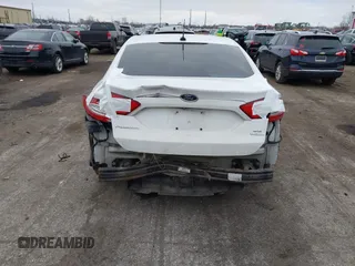 2015 Ford Fusion SE with VIN 3FA6P0H9XFR181132, listed as a IAAI auction lot 41075635 with 216,089 mi miles and . Bid and sale history available at DreamBid. Image 6.