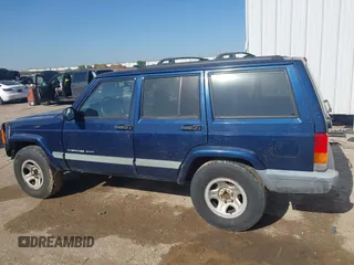 2001 Jeep Cherokee Sport with VIN 1J4FT48S01L522281, listed as a IAAI auction lot 41999570 with 261,698 mi miles and . Bid and sale history available at DreamBid. Image 14.