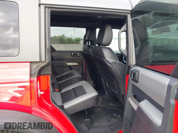 2023 Ford Bronco z VIN 1FMEE5DH5PLB93397, wystawiony jako IAAI lot #42531965 z przebiegiem 30 731 mil mil oraz . Historia ofert i sprzedaży dostępna na DreamBid. Obrazek 8.