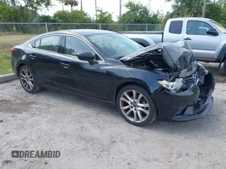 2016 Mazda Mazda6 i Touring with VIN JM1GJ1V53G1431880, listed as a IAAI auction lot 42079970 with 111,179 mi miles. Bid and sale history available at carsss.com. Image 1.