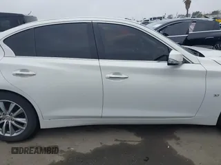2015 Infiniti Q50 Premium with VIN JN1BV7AP6FM342619, listed as a IAAI auction lot 41871222 with 162,873 mi miles. Bid and sale history available at carsss.com. Image 13.