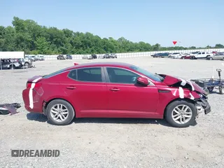2011 Kia Optima LX z VIN KNAGM4A76B5072989, wystawiony jako IAAI lot #42296570 z przebiegiem 70 500 mil mil oraz . Historia ofert i sprzedaży dostępna na DreamBid. Obrazek 14.