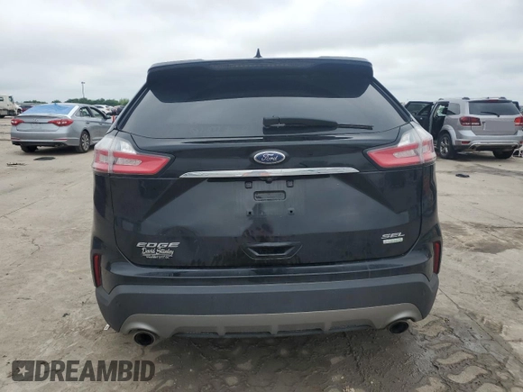 2020 Ford Edge SEL z VIN 2FMPK3J90LBA44070, wystawiony jako Copart lot #54606065 z przebiegiem 63 153 mil mil oraz Szkoda całkowita • Salvage title. Historia ofert i sprzedaży dostępna na DreamBid. Obrazek 6.