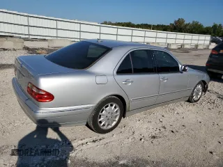 2002 Mercedes-Benz E-Class with VIN WDBJF82J42X077731, listed as a Copart auction lot 70280584 with 169,018 mi miles and Salvage Title. Bid and sale history available at carsss.com. Image 3.