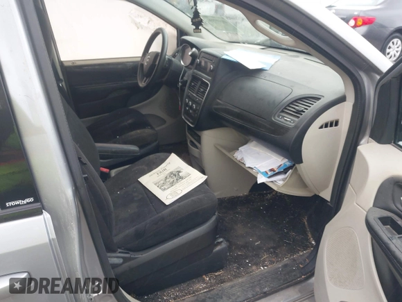 2013 Dodge Grand Caravan SE with VIN 2C4RDGBG2DR773577, listed as a IAAI auction lot 41823951 with 226,498 mi miles and . Bid and sale history available at DreamBid. Image 5.