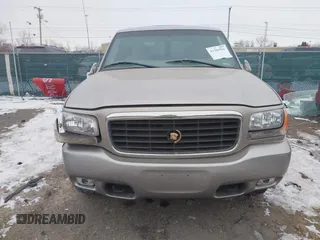 2000 Cadillac Escalade z VIN 1GYEK63R1YR197386, wystawiony jako IAAI lot #41386599 z przebiegiem 77 657 mil mil oraz . Historia ofert i sprzedaży dostępna na DreamBid. Obrazek 13.
