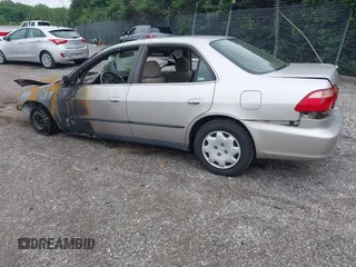 1999 Honda Accord LX with VIN 1HGCG6659XA113823, listed as a IAAI auction lot 42462228 with Not provided miles and . Bid and sale history available at DreamBid. Image 3.