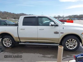 2014 Ram 1500 Longhorn Limited with VIN 1C6RR7PT9ES127063, listed as a IAAI auction lot 41817112 with 126,203 mi miles and . Bid and sale history available at DreamBid. Image 14.