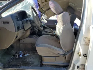 1998 Kia Sportage with VIN KNDJB7232W5569054, listed as a Copart auction lot 82756824 with 106,550 mi miles and Salvage Title. Bid and sale history available at carsss.com. Image 7.