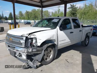 2013 Chevrolet Silverado 1500 LT with VIN 3GCPKSE71DG358722, listed as a IAAI auction lot 42128592 with 206,779 mi miles and . Bid and sale history available at DreamBid. Image 2.