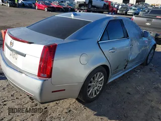2010 Cadillac CTS Luxury with VIN 1G6DE5EG6A0111713, listed as a IAAI auction lot 41151719 with 138,277 mi miles and . Bid and sale history available at DreamBid. Image 4.