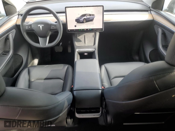 2023 Tesla Model Y Long Range with VIN 7SAYGDEE2PA024693, listed as a Copart auction lot 52595935 with 35,179 mi miles and Salvage Title. Bid and sale history available at DreamBid. Image 8.