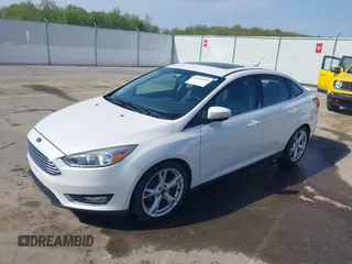 2016 Ford Focus Titanium z VIN 1FADP3J23GL358772, wystawiony jako IAAI lot #42103694 z przebiegiem 85 290 mil mil oraz . Historia ofert i sprzedaży dostępna na DreamBid. Obrazek 17.
