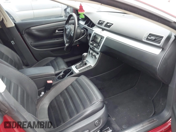 2014 Volkswagen CC Sport with VIN WVWBN7AN0EE527558, listed as a IAAI auction lot 41336204 with 130,005 mi miles and . Bid and sale history available at DreamBid. Image 5.