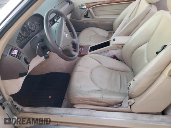1999 Mercedes-Benz SL-Class with VIN WDBFA68F8XF178084, listed as a Copart auction lot 82295024 with 123,008 mi miles and Salvage Title. Bid and sale history available at carsss.com. Image 7.