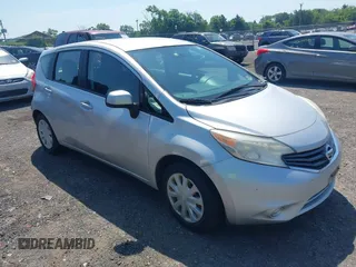 2014 Nissan Note S Plus z VIN 3N1CE2CPXEL395689, wystawiony jako IAAI lot #42582976 z przebiegiem 111 556 mil mil oraz . Historia ofert i sprzedaży dostępna na DreamBid. Obrazek 1.